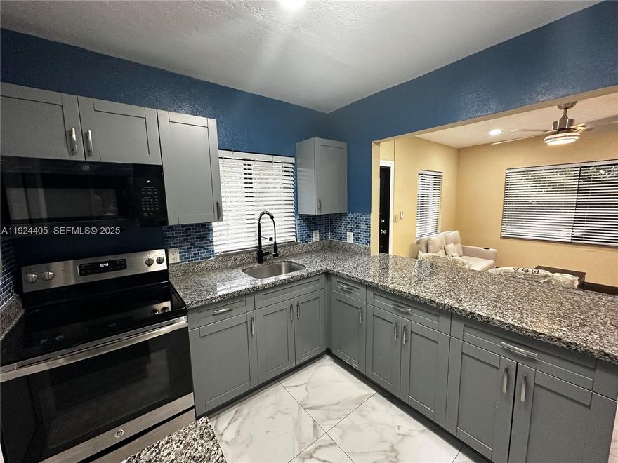 Turnkey Duplex Near Miami Design District – Updated, Income-Ready, and Packed With Potential located just three blocks from the Miami Design District. This fully remodeled duplex offers the perfect blend of lifestyle, income, and long-term value. Sitting on an oversized 7,200 sq ft lot, the property features a 1BD/1BA front unit and a 2BD/1BA rear unit, each upgraded with impact windows and doors, a newer roof, modern interiors, independent parking areas, and separate electrical meters. Best of all, the property is in a zone that requires no flood insurance, adding significant savings for owners and investors. Positioned between the MiMo District and Wynwood and just minutes from Downtown Miami, Brickell, and Miami Beach, this location is ideal for consistent rental demand and future development upside. Use it as live-in-one, rent-the-other, operate long- or short-term rentals, or hold as a prime redevelopment opportunity in one of Miami’s fastest-growing urban corridors. Opportunities like this move quickly - Schedule your private tour - Request rental projections - Secure a fully updated, income-producing asset in the Design District corridor. Contact me today!