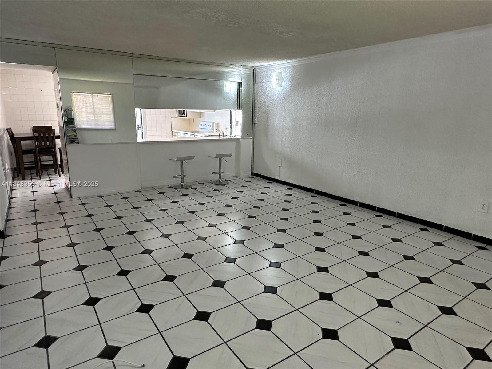 Very large and spacious condo with amazingly large private back yard. Recent updates. Freshly painted. (Old pictures due to still being worked on) Spacious living and dining area. Large bedrooms with great closets. Very large eat-in kitchen. Sliding doors from kitchen lead to a great back yard with covered patio and a private parking space with street entrance. Showing strictly by appt. 1 assigned parking provided by association but you can purchase additional decals, plenty of guest spots rent includes water. Next to Bucky Dent Park- Baseball / Softball,Children's playground, Indoor basketball gymnasium Park, Recreation Center building, & Water Park. HOA requires $500 deposit from the tenant which shall be returned at lease end and after vacating.