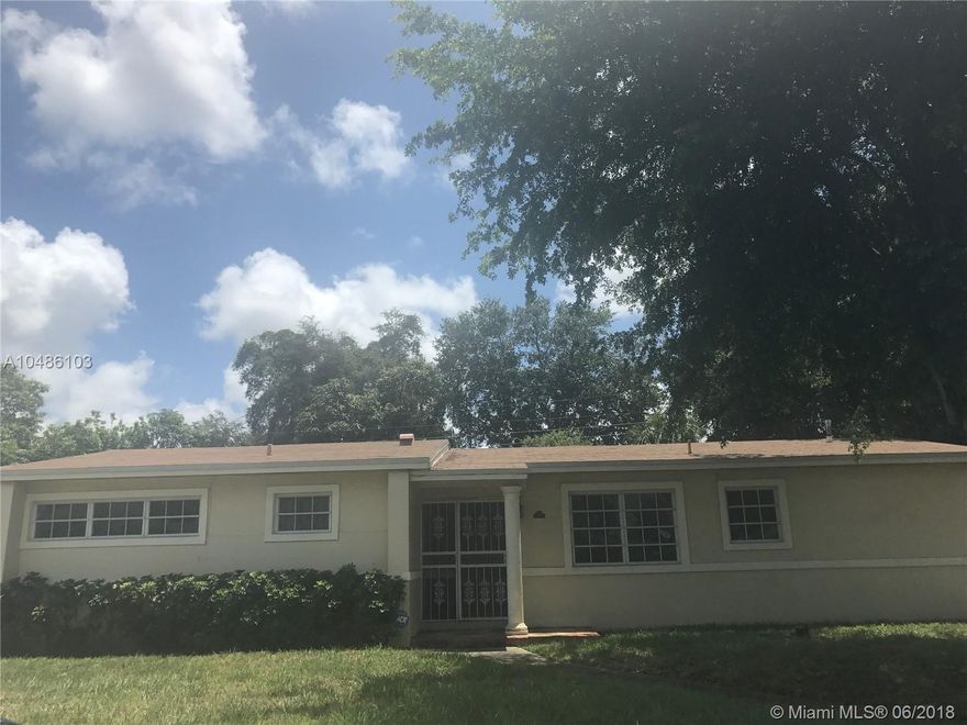 Spacious 3 bedroom 1 bathroom house with an open floor plan and  plenty of closet space.  This home has tile floors and terrazzo underneath the carpeted floors and a new roof.  The new roof has a transferable warranty to the new owner.   This home sits on a nice sized lot and has a fully fenced back yard.   This property is a must see!  Conveniently located, near shopping destinations and schools.  This property is sold as is.