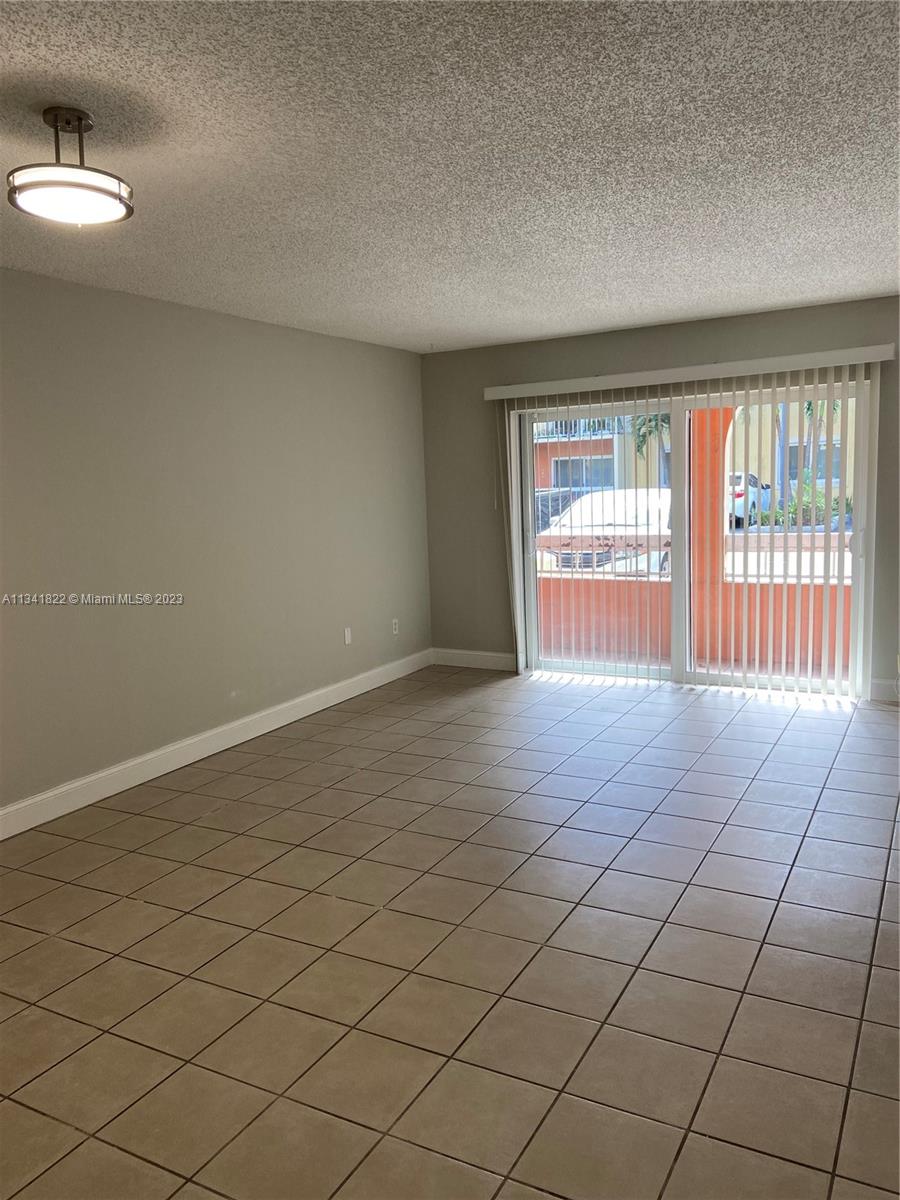 UPDATED first floor unit in well maintained Village of Kings Creek. Tile floors, high impact window, sliding door and front door. New central a/c & heat. Freshly painted, new led lights, walk in closet, plus additional closets. Across from laundry room (2 per floor). Roving 24 hrs. security guards. 4 pools, men & ladies gyms, basketball court, bbq area, gated. Convenient location near Dadeland Mall, Baptist Hospital, metrorail, Palmetto Xway. Available now. WON'T LAST! Easy to show. Call Owner/Agent. First, last and security deposit, credit verification and ASSOCIATION APPROVAL REQUIRED prior to moving.