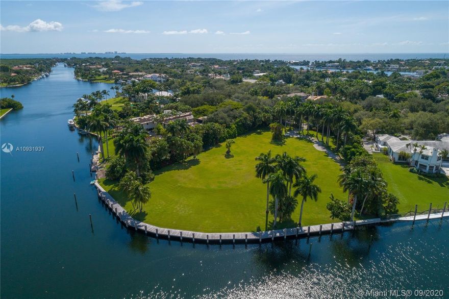 The largest waterfront lot available in guard-gated Gables Estates- the most exclusive enclave in Coral Gables!  This property is approximately two acres (82,195 SF, as per survey) with 325 linear feet on the wide-waterway!  Experience magnificent panoramic views, spectacular sunsets, and gentle breezes from one of the best waterfront properties in all of South Florida!  Recently completed seawall and docks can accommodate TWO mega-yachts or multiple vessels!  Plans for a new 20,000+/- SF custom home from renowned architect Cesar Molina are available (see renderings). Permits are in the final stages of approval, thereby saving the new owner significant time and money! Close to most of Miami's best schools, fine dining, & luxury shopping!