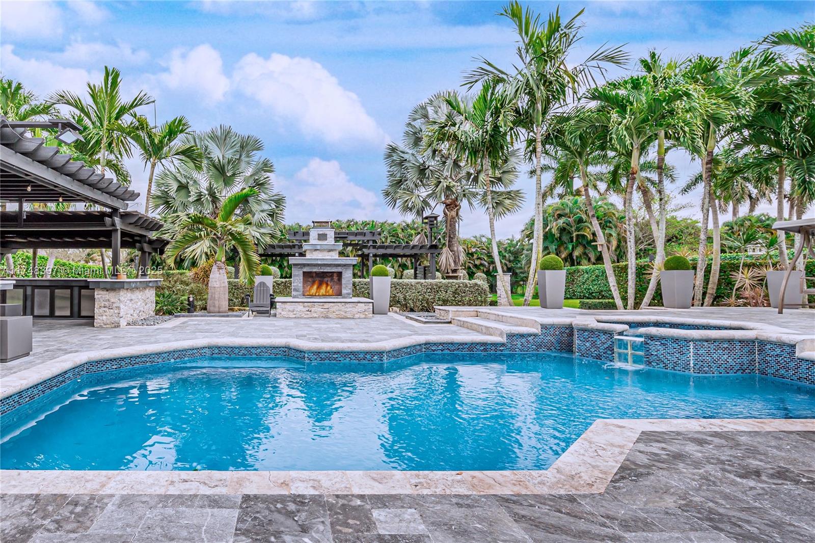 Motivated Seller! Immaculate One of a Kind Turn Key Home located on a Builder's Acre in the Exclusive Community of Mystique Estates. This Stunning 4-bed, 2.5-bath Estate offers Luxury and Modern Convenience. The Oversized Lot features a Heated Salt Water Pool, Outdoor Fire Place, Jacuzzi, Two Stainless Steel Outdoor Kitchens, 2Â Beautiful Pergolas, New Fire Pit with Stone Walkway, and a State-of-the-Art Infrared Sauna. Inside, Enjoy a Smart Home System, Sonos Roof Speakers, Freshly Painted Interiors, and a Gourmet Kitchen with New Stainless Steel Appliances. Additional features include Impact Windows, New AC, Solar Roof Vents, and a 3-Car Garage with ample storage. With a 2018 Roof, Water Filtration system, and Modern Lighting, This Home perfectly balances Style, Comfort, and Technology.