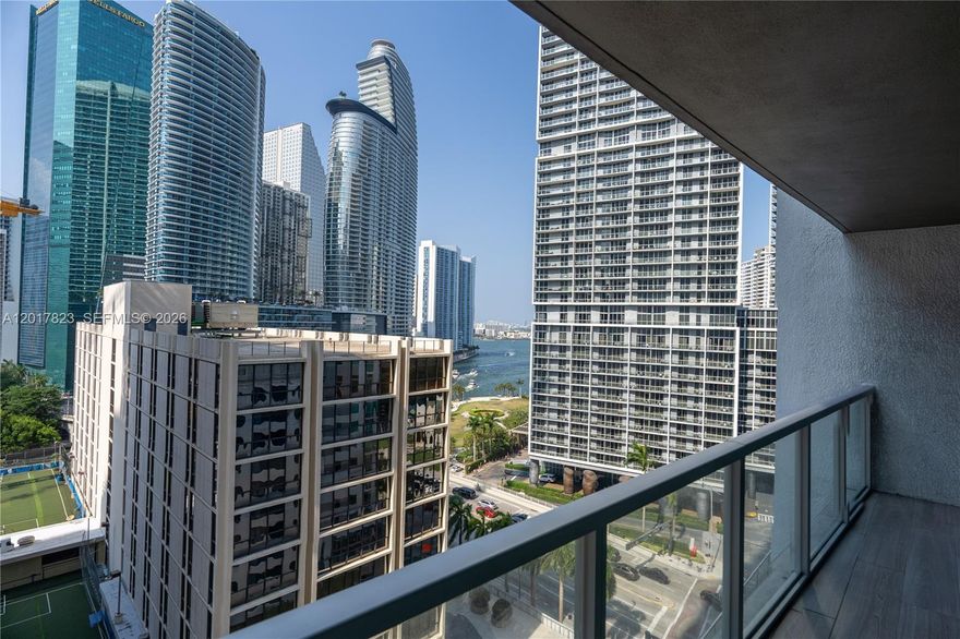 Remodeled 2/2 at 500 Brickell, move-in ready with quality finishes, Porcelanosa tiles across the unit and large windows in every room. Views of the ocean, pool, and Brickell skyline. Features include motorized blackout and privacy shades, smart thermostat, and smart lighting across the unit. Kitchen has stainless steel appliances with a new microwave and cooktop. New in-unit washer/dryer. AC system with UV-light air treatment. Building amenities: two pools, gym, spa, EV chargers, theater, club rooms, massage room, sunset room, 24-hour security, and valet. Building allows 12 rents/year, min 30 days, which can be perfect for corporate rental.