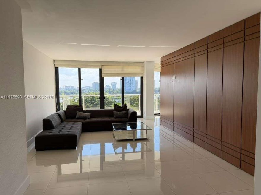 Absolutely gorgeous unit with beautiful Golf and garden view, very quiet & super-private, with renovations. This unit features High gloss 32" x 32" porcelain tiles throughout, modern baseboards, LED lighting, Outlets, and switches that are screwless, New closet systems designed. European kitchen & bathrooms with a w/endless list of luxury finishes. Impact Windows and new glass balconies. Enjoy luxury living at The Hamptons, two pools, a private gourmet restaurant, movie theater, state-of-the-art fitness center and spa, tennis and racquetball courts, and more. CAN BE RENTED FURNISHED OR UNFURNISHED!