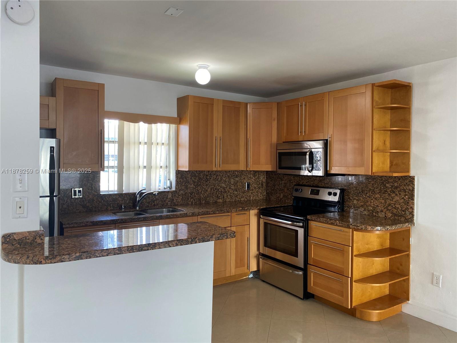 VILLAGE AT DADELAND CONDO - Residential