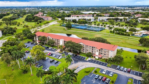 Photo of 901 SW 128th Ter #212A, Pembroke Pines, FL 33027 (MLS # A12103352)