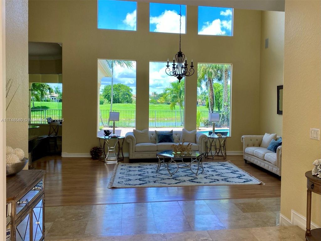 Photo of 11904 NW 69th Pl #11904, Parkland, FL 33076 (MLS # A11748580)