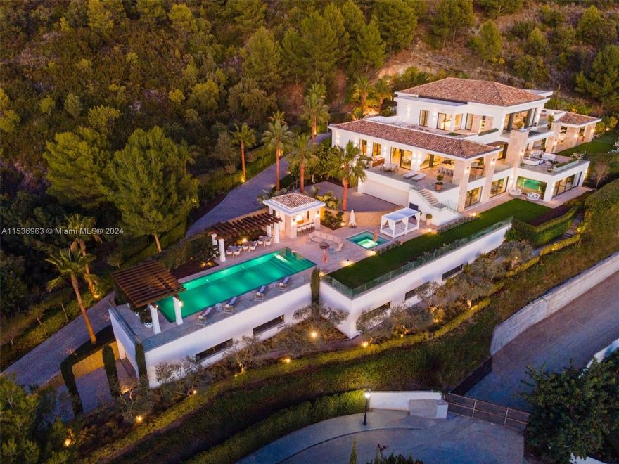 Property is located in Marbella, Spain. Villa Zeus stands as Marbella's crown jewel in the prestigious Cascada de Camoján. This luxurious resort-style villa offers modern architecture infused with Mediterranean allure. Nestled in a gated community with 24-hour security, it boasts the finest location in the area. The villa's grand entrance hall features soaring ceilings and architectural marvels, leading to a living area with panoramic views of the Mediterranean Sea and Africa. Every bedroom is a lavish retreat, while the lower level hosts a state-of-the-art spa, cinema room, and entertainment space. With expansive terraces, a well-equipped kitchen, and ample amenities, Villa Zeus epitomizes the pinnacle of luxury living in Marbella.