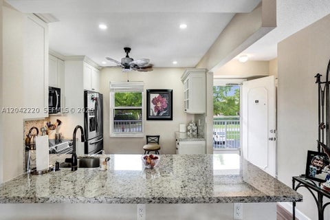Tiny photo for 415 SE 11th Ter #207, Dania Beach, FL 33004 (MLS # A12042220)