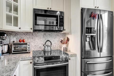Tiny photo for 415 SE 11th Ter #207, Dania Beach, FL 33004 (MLS # A12042220)