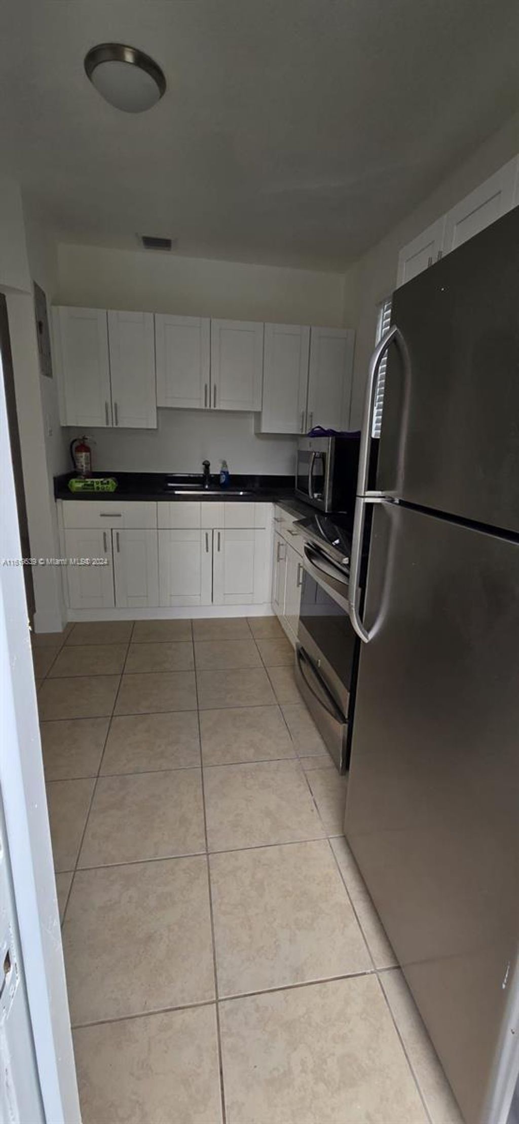 Photo of 1221 NW 23rd Ter #0, Fort Lauderdale, FL 33311 (MLS # A11619539)