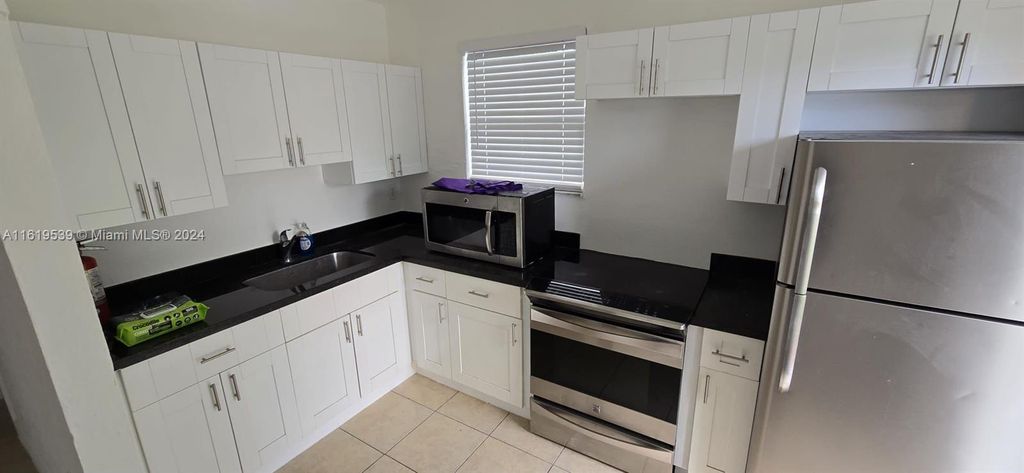 Photo of 1221 NW 23rd Ter #0, Fort Lauderdale, FL 33311 (MLS # A11619539)