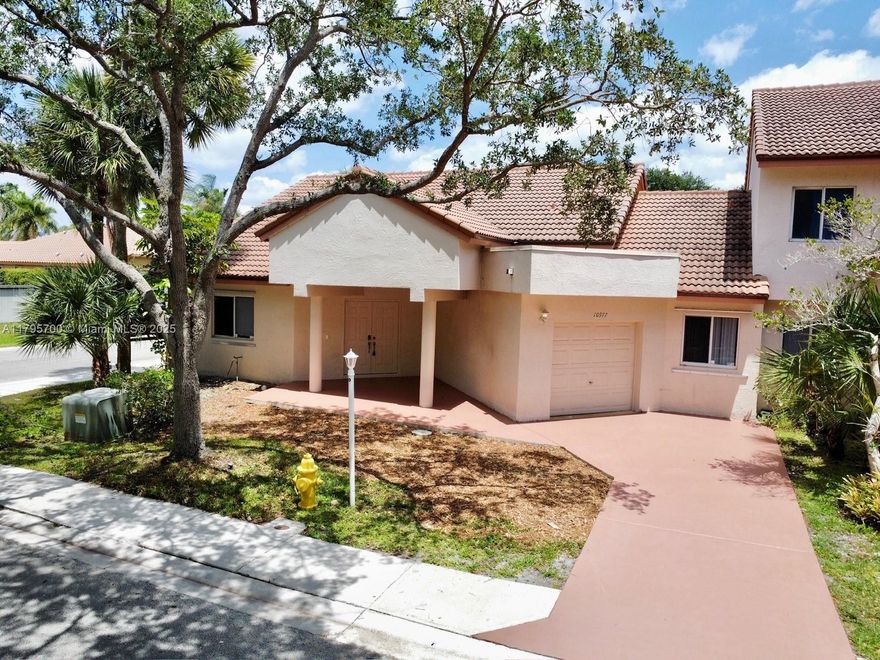 Welcome to this beautifully laid-out 1-story townhome featuring 3 beds, 2.5 baths, w/1-car garage, nestled on a desirable corner lot in the heart of Plantation. This well-maintained property offers generous living areas, ideal for both relaxing and entertaining. Featuring a thoughtfully designed layout with guest bedrooms connected by a convenient Jack/Jill bathroom, and a spacious primary suite complete with a large walk-in closet. Roof 2016, Enjoy being just steps away from the community clubhouse and pool—perfect for enjoying Florida’s lifestyle year-round. With a prime location close to shopping, dining, and major highways, this home offers both comfort and convenience. Priced to sell, presenting an excellent opportunity for buyers seeking space, location, and value. Investors dream!