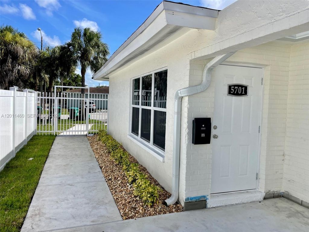 Photo of 5719 NW 28th St #5719, Lauderhill, FL 33313 (MLS # A12011460)