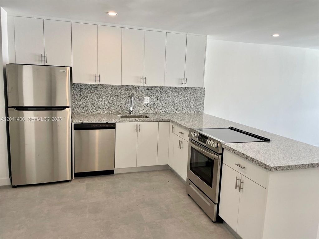 Photo of 5719 NW 28th St #5719, Lauderhill, FL 33313 (MLS # A12011460)