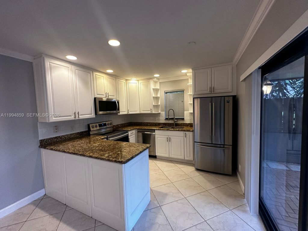 Photo of 7671 W Courtyard Run W, Boca Raton, FL 33433 (MLS # A11994859)