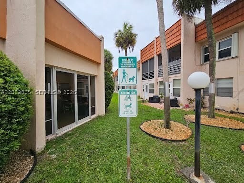 Photo of 7610 Stirling Rd #104C, Davie, FL 33024 (MLS # A12032835)
