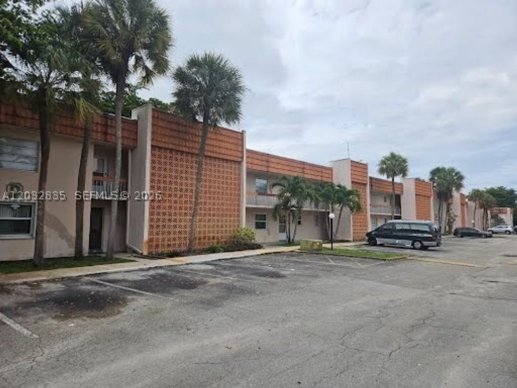Photo of 7610 Stirling Rd #104C, Davie, FL 33024 (MLS # A12032835)