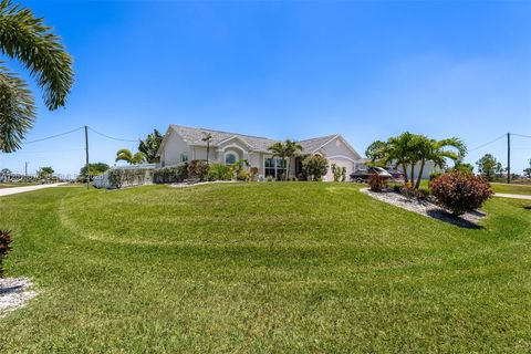 Photo of 2553 NW 21st Pl, Cape Coral, FL 33993 (MLS # A12015876)