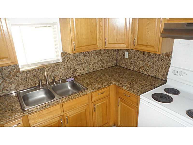 Sec 8 OK. All tile floors, unit paid off w/no mortgage. Unit in good shape, building needs some maintenance. Close to N Miami business district. 1st, last and deposit to move in, unless applicants make over $3,100 a month and have no police or evictio n record, in which case, move in requirements may be lowered. Section 8 need only one month deposit to move in, and it maybe negotiable.