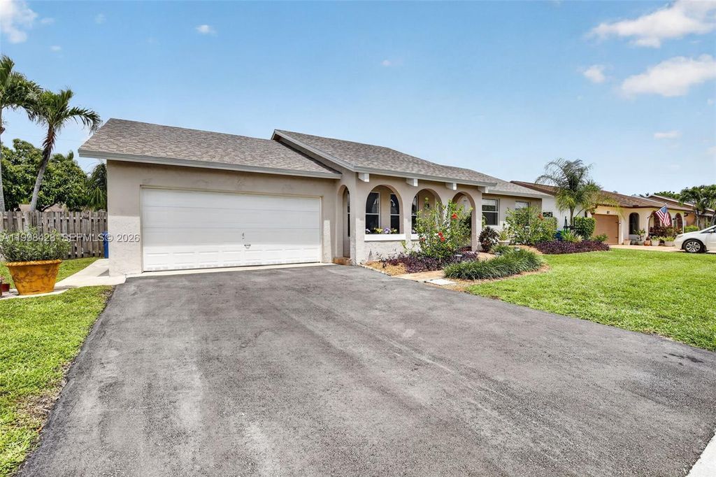 Photo of 10471 NW 21st Ct, Sunrise, FL 33322 (MLS # A11998423)