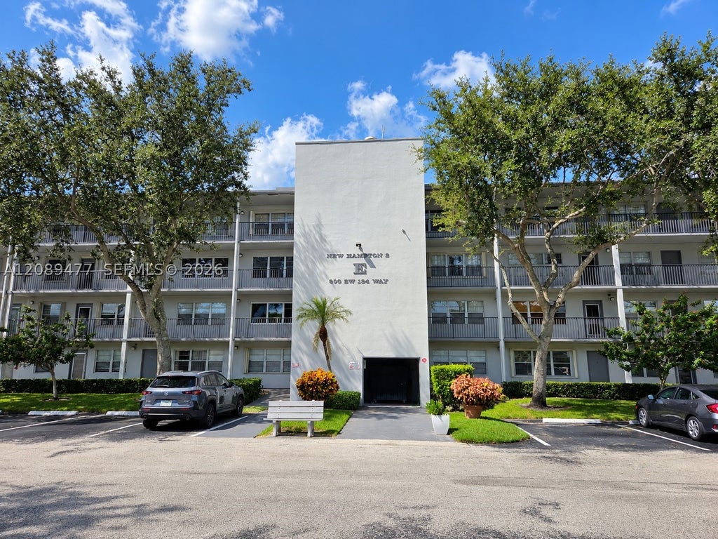 Photo of 300 SW 134th Way #105E, Pembroke Pines, FL 33027 (MLS # A12089477)