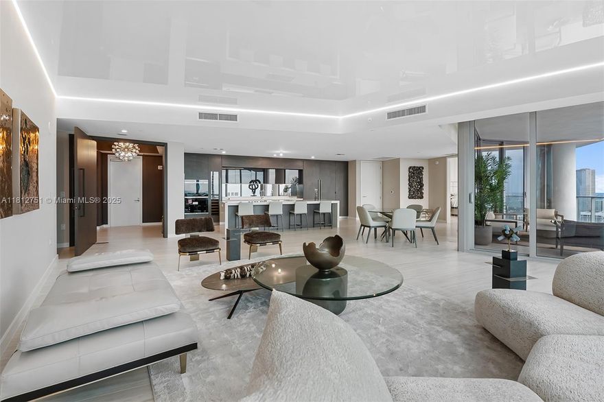 Best priced Penthouse in all of Downtown! Immerse yourself in breathtaking 180-degree views from this sleek 3,300 square foot TROPHY Penthouse. Elevate your lifestyle by living in the heart of the new MIAMI WORLD CENTER. Over 250k in furnishings, 4 Bedrooms plus a large den, and 5 full bathrooms. The building you never have to leave includes every amenity. 5 pools, private jacuzzi’s, a FULL Spa, state of the art fitness center, boxing ring, basketball court, racquetball, yoga, recording studio, and so much more. Walk downstairs and you are steps from Kaseya Center, Port of MIA, Club Studio, Lululemon, and the best restaurants Miami has to offer.