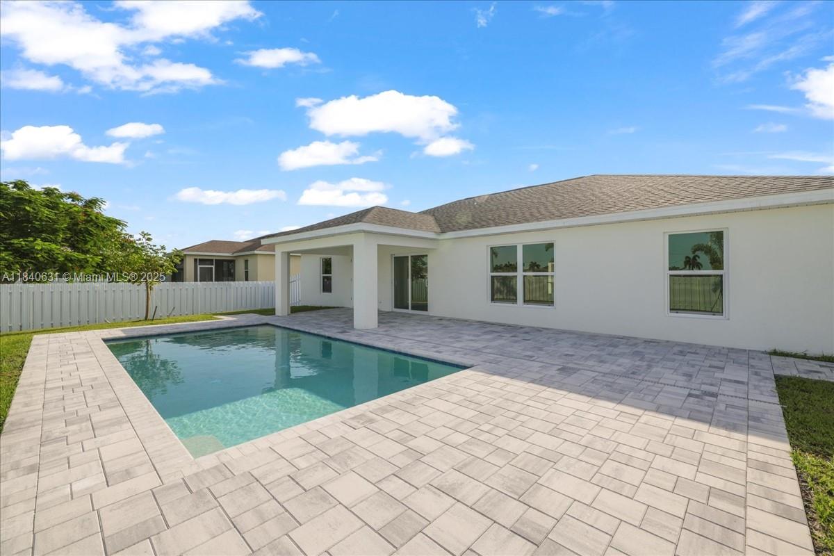 $20,000 BUILDER PAID CLOSING COSTS! BRAND NEW POOL HOME WITH PRIVACY FENCE! TWO PRIMARY SUITES NO FLOOD ZONE & IMPACT WINDOWS, The open-concept floor plan is perfect for modern living, seamlessly flowing into the huge lanai and paver patio, where your sparkling heated pool awaits. Gourmet kitchen, featuring stainless steel appliances, all-wood, soft-close cabinetry, quartz countertops, a large island with breakfast bar, and a spacious pantry. The wide-open living areas boast vaulted ceilings and luxury hard surface flooring throughout, creating a bright, airy atmosphere. Each bedroom comes with a ceiling fan for added comfort. Plus, this home includes a dedicated pool bath, making outdoor entertaining even more convenient! This is The Tidewater Plan.