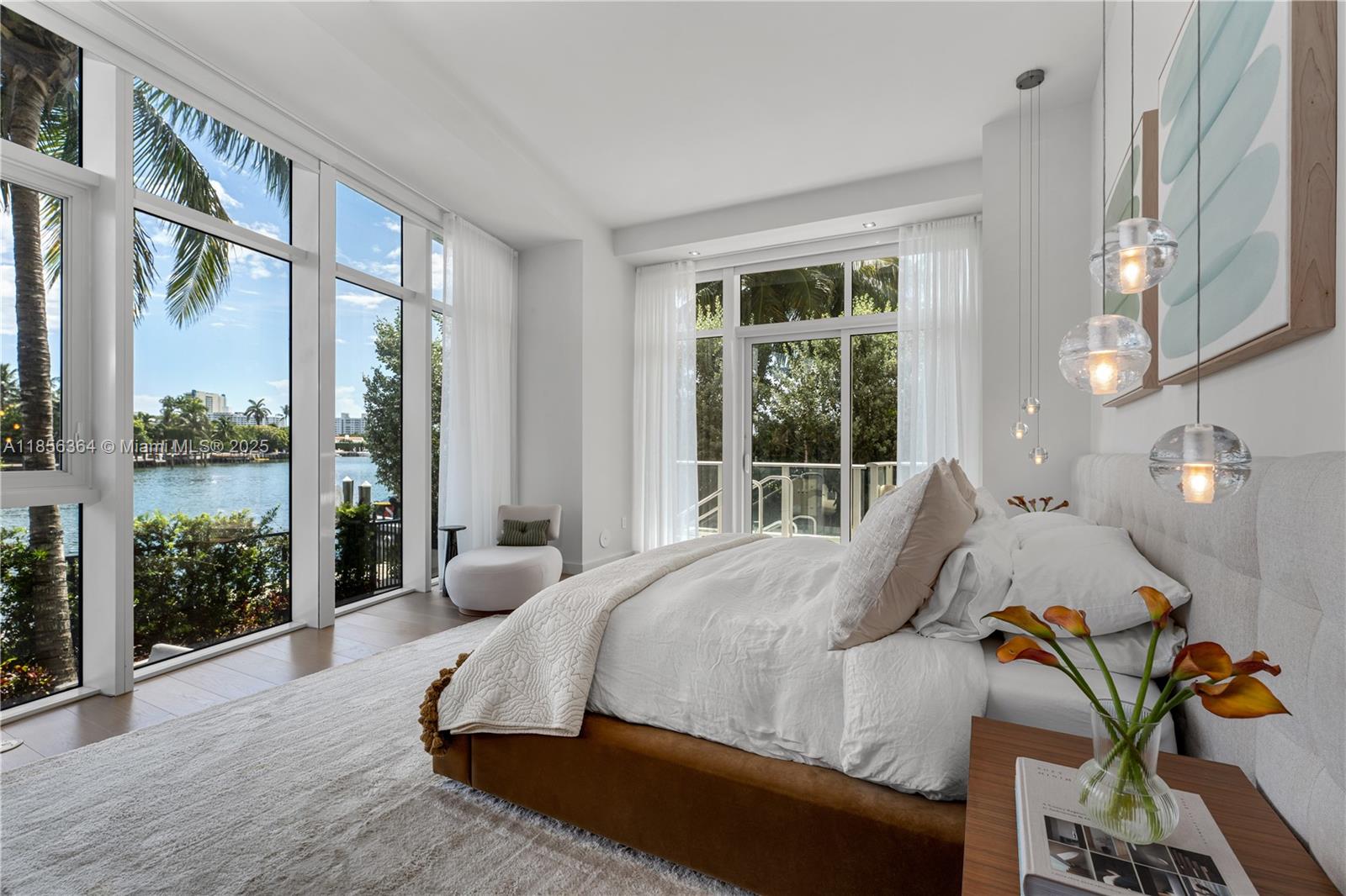 Experience resort-style living at The Ritz-Carlton Residences Miami Beach in this exquisitely renovated 2-bedroom, 3.5-bath residence with an oversized den. This rare first-floor home offers the ultimate in privacy and convenience, featuring direct backyard and water access plus your own private plunge pool. Designed with meticulous attention to detail, the residence boasts custom built-ins, designer millwork, and comes fully furnished for the perfect turnkey rental or effortless move-in. Floor-to-ceiling windows flood the open living and dining areas with natural light, while the primary suite frames serene water views. Enjoy world-class amenities including a half-acre rooftop pool with restaurant service, private art studio, state-of-the-art fitness center