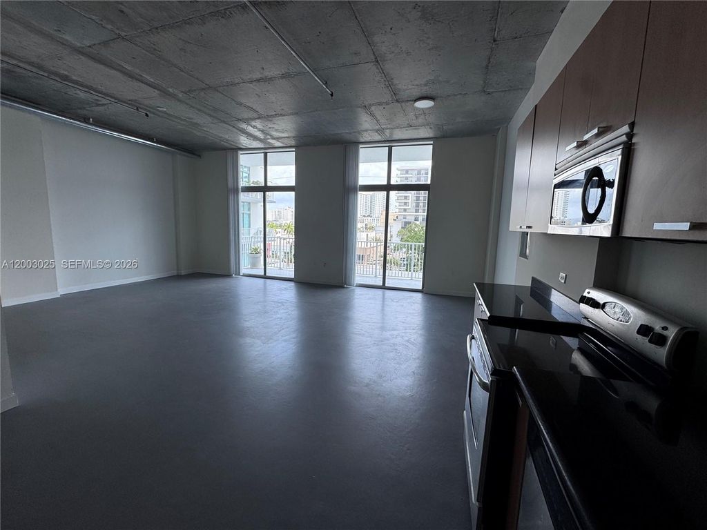 Photo of 2100 Van Buren St #412, Hollywood, FL 33020 (MLS # A12003025)