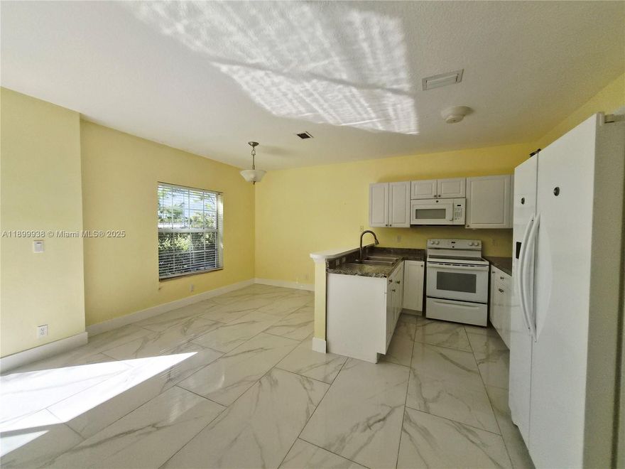 Charming 3 bedroom, 2.5-bath unit with 1-car garage in a small, quiet complex. Tile downstairs, laminate on stairs. Fully fenced yard. Great location close to major highways just minutes from Pompano beaches, Fort Lauderdale International Airport and Tri rail Pompano Beach Station. Perfect for easy South Florida living!