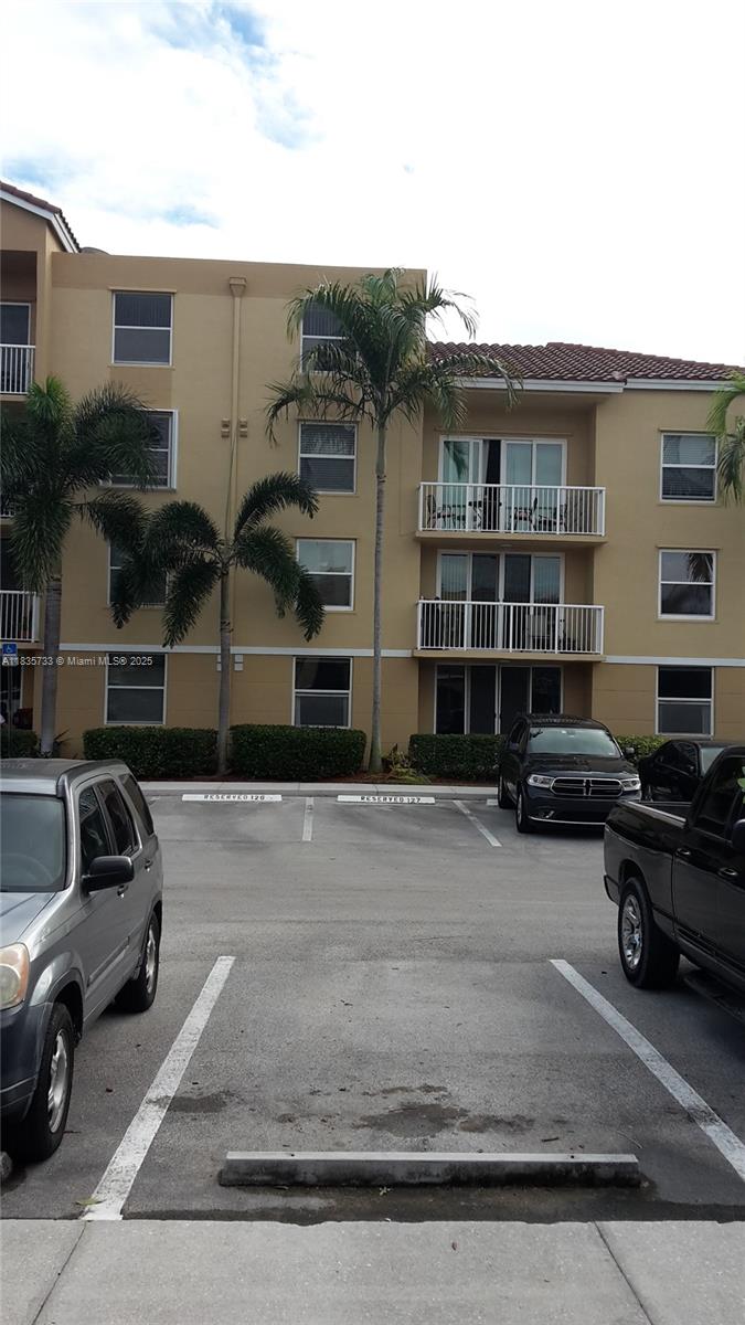 Beautiful remodeled 2 bed/2bath condo. Private, corner unit with oversized access to the common outdoor garden. Beautiful back views of the conservation area. Surrounded by nature, minutes away to the closest beaches, shopping and dining. Open floor plan, spacious bedrooms, large dining/living room combo, outdoor patio. Plenty of storage. Wooden kitchen cabinets, granite countertops, wood flooring throughout. Laundry closet located in the kitchen area, new washer and dryer. Safe gated community with an easy access to the main roads, highways and Fort Lauderdale International Airport. The unit comes with 1 assigned parking space.