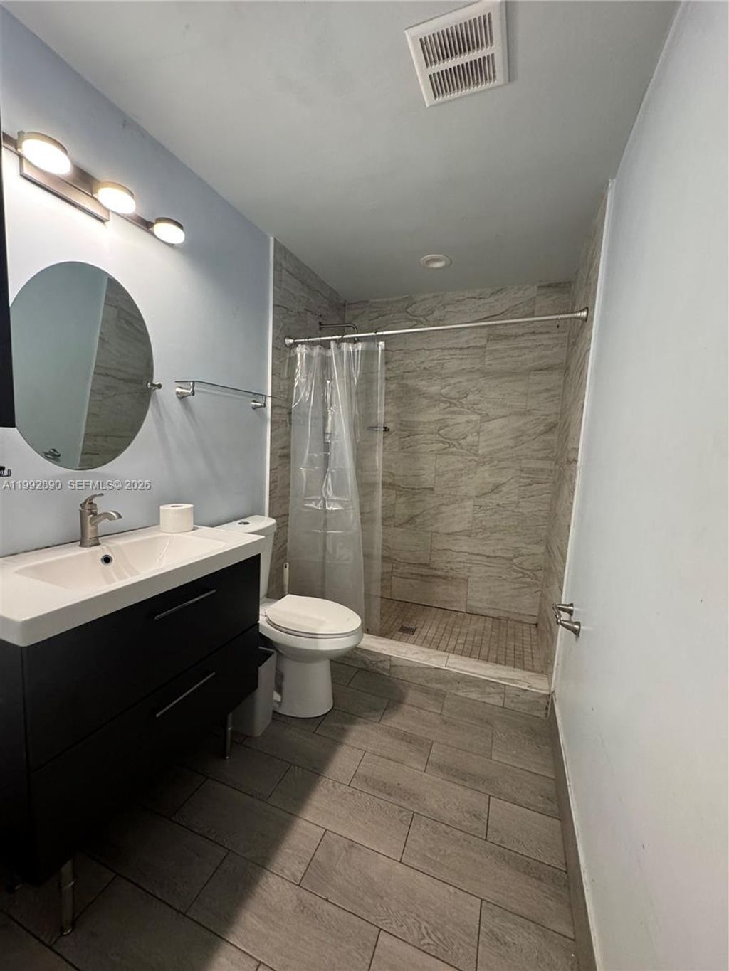 Photo of 5890 NW 16th Ct, Sunrise, FL 33313 (MLS # A11992890)