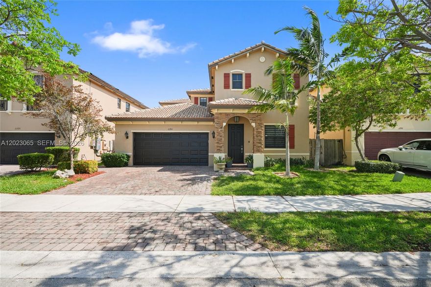 Beautiful and highly desirable 4-bedroom, 3.1-bath single-family home featuring a legal in-law suite with private entrance, a rare and exclusive model now available in the sought-after community of Silver Palm West!This exceptional property offers modern flooring throughout, spacious and light-filled living areas, and an excellent open-concept layout perfect for everyday living and entertaining.The stunning primary suite features an oversized bathroom and a large walk-in closet. Upstairs, you’ll find generously sized bedrooms and ample bathrooms designed for comfort and convenience. The open kitchen flows seamlessly into the dining, living, and expansive family room areas, creating the perfect gathering space.Step outside to a breathtaking fenced backyard ideal for entertaining, relaxing, or family gatherings. A standout feature of this home is the private in-law suite with its own separate entrance, full kitchen, dining and living area, perfect for extended family, guests, or extra space. Additional highlights include abundant natural light, double car garage, plenty of parking, and excellent overall condition.Residents enjoy resort-style amenities including a clubhouse, pool, water playground for kids, fitness center, parks, and much more. Prime location just minutes from the Turnpike,Black Point Marina, Homestead Air Reserve Base, Baptist Hospital, shopping centers, restaurants, entertainment, and only a short drive to the beach. This one-of-a-kind property is a must-see!