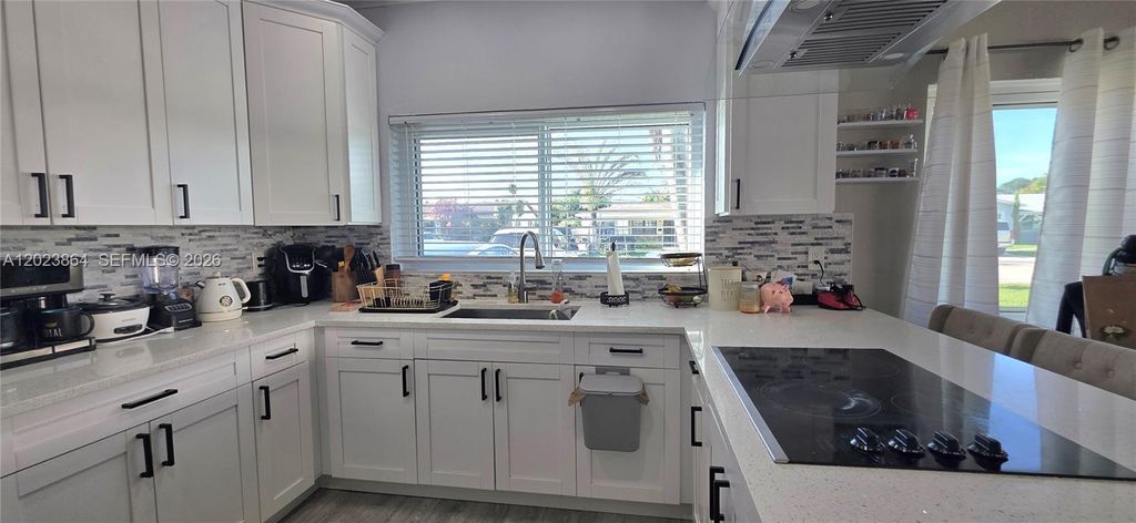 Photo of 6428 Flagler St #6428, Hollywood, FL 33023 (MLS # A12023864)
