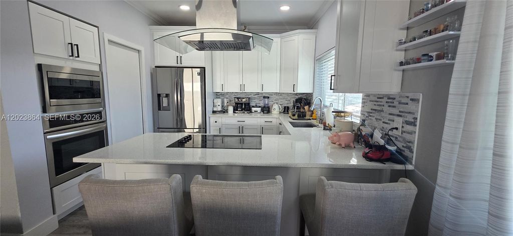 Photo of 6428 Flagler St #6428, Hollywood, FL 33023 (MLS # A12023864)
