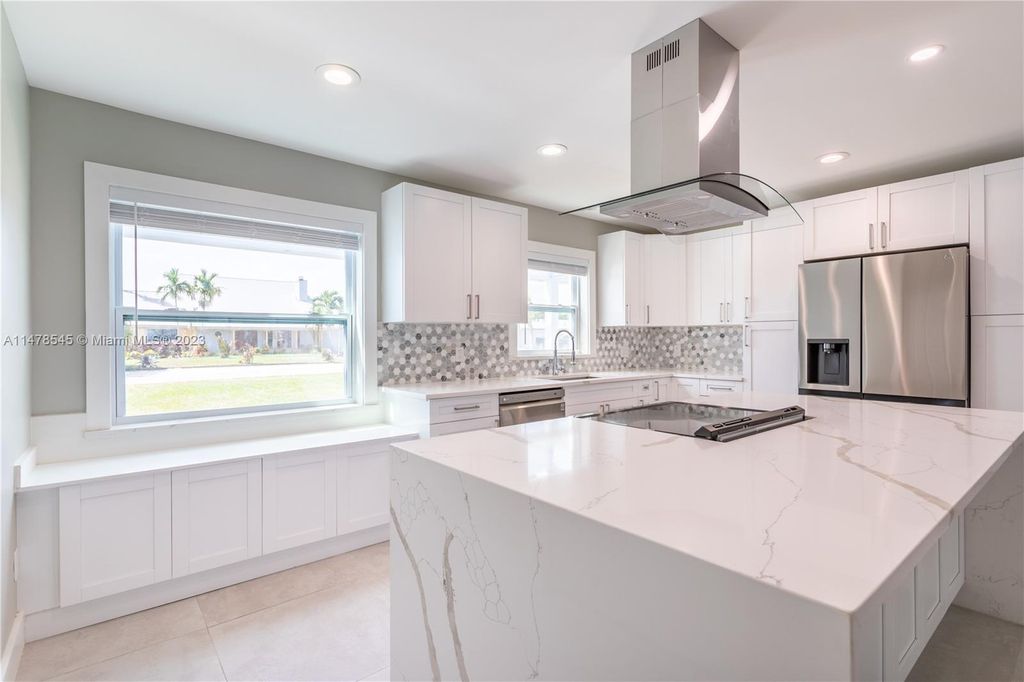 Photo of 5646 SE Sailfish Way, Stuart, FL 34997 (MLS # A11478545)