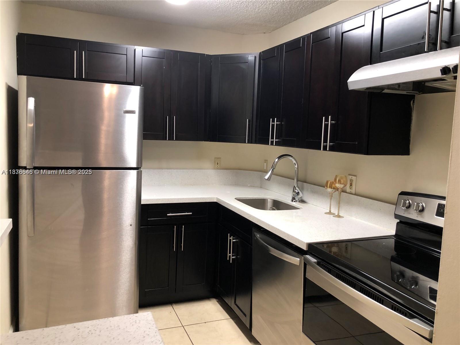 Beautiful, move in ready 2 bedroom 1 bathroom condo unit in a Resort like community called Lakes of Jacaranda. Spacious living room, stainless steel appliances and new washer/dryer in unit Pet friendly community that has great amenities like the Clubhouse, two swimming pools, tennis court, gym, picnic/barbeque areas and jog/bike paths. Walking distance or a few minutes drive to shopping malls and excellent schools.