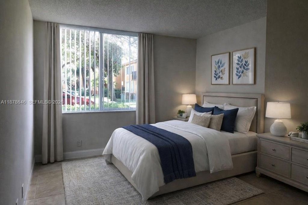 Photo of 10757 Cleary Blvd #104, Plantation, FL 33324 (MLS # A11878646)