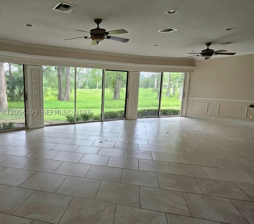 Photo of 4602 King Palm Dr, Tamarac, FL 33319 (MLS # A12054193)