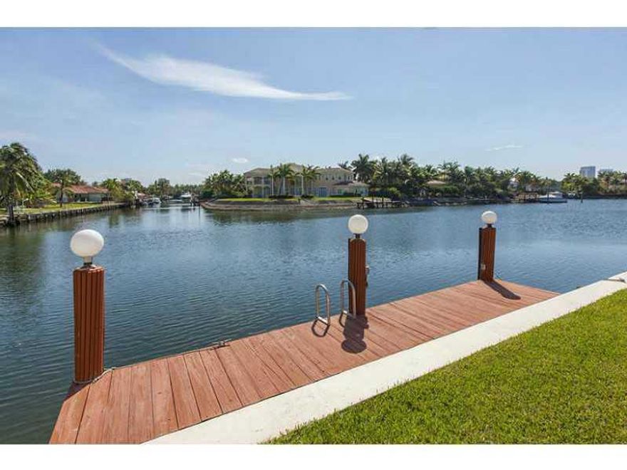 SPECTACULAR WATERFRONT 19,431 SQFT LAND. DEEDED DOCK. SPACIOUS 4 BEDROOMS 2 BATHS IN ONE LEVEL- 3,273 SQFT OF INTERIOR SPACE. COVERED POOL AND HUGE BACKYARD. VERY QUIET AND SAFE UPSCALE NEIGHBORHOOD WITH EASY ACCESS TO MAJOR ROADS & CLOSE TO HOLLYWOOD BEA CHES.