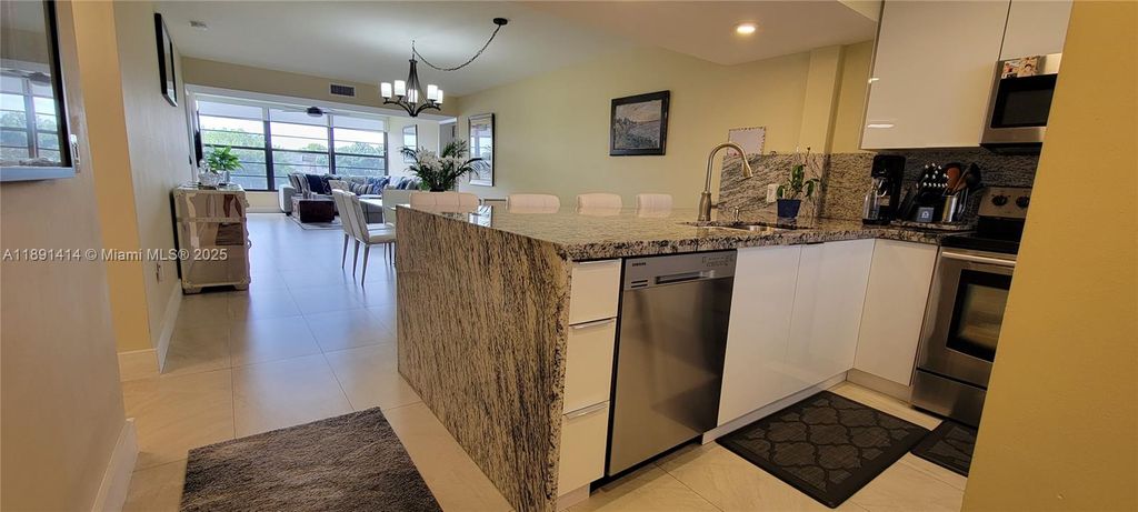 Photo of 1530 Whitehall Dr #405, Davie, FL 33324 (MLS # A11891414)