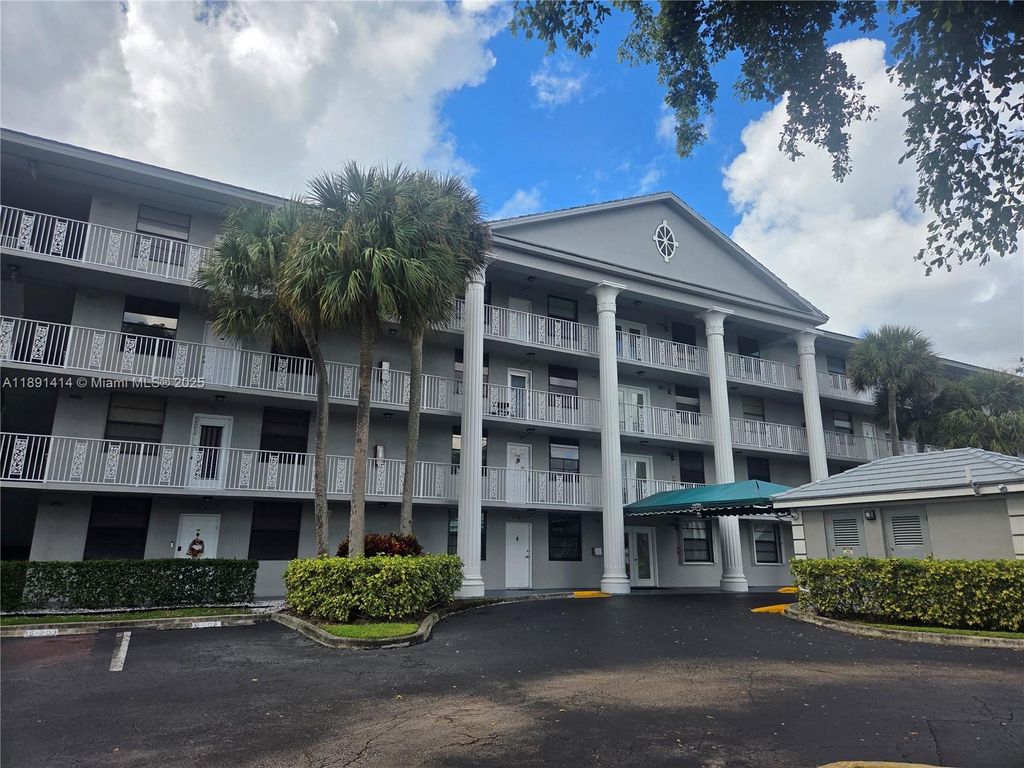 Photo of 1530 Whitehall Dr #405, Davie, FL 33324 (MLS # A11891414)