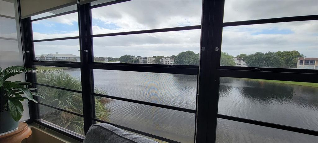 Photo of 1530 Whitehall Dr #405, Davie, FL 33324 (MLS # A11891414)