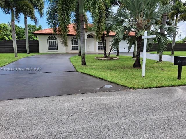 This beautiful 4-bedroom, 3 bathroom home offers the perfect balance of space, comfort, and style on a huge oversized lot. There’s plenty of room for a pool, boat, RV, and more! Inside, you’ll find an updated kitchen, tile floors throughout, and a fenced yard that provides both privacy and security. The home is also equipped with zoned A/C and a built-in generator with diesel tanks, ensuring you’re prepared for any storm. Plus, a storage shed offers extra room for all your belongings. Don’t miss this rare opportunity to own a well-appointed home on a generous lot—schedule your tour today!