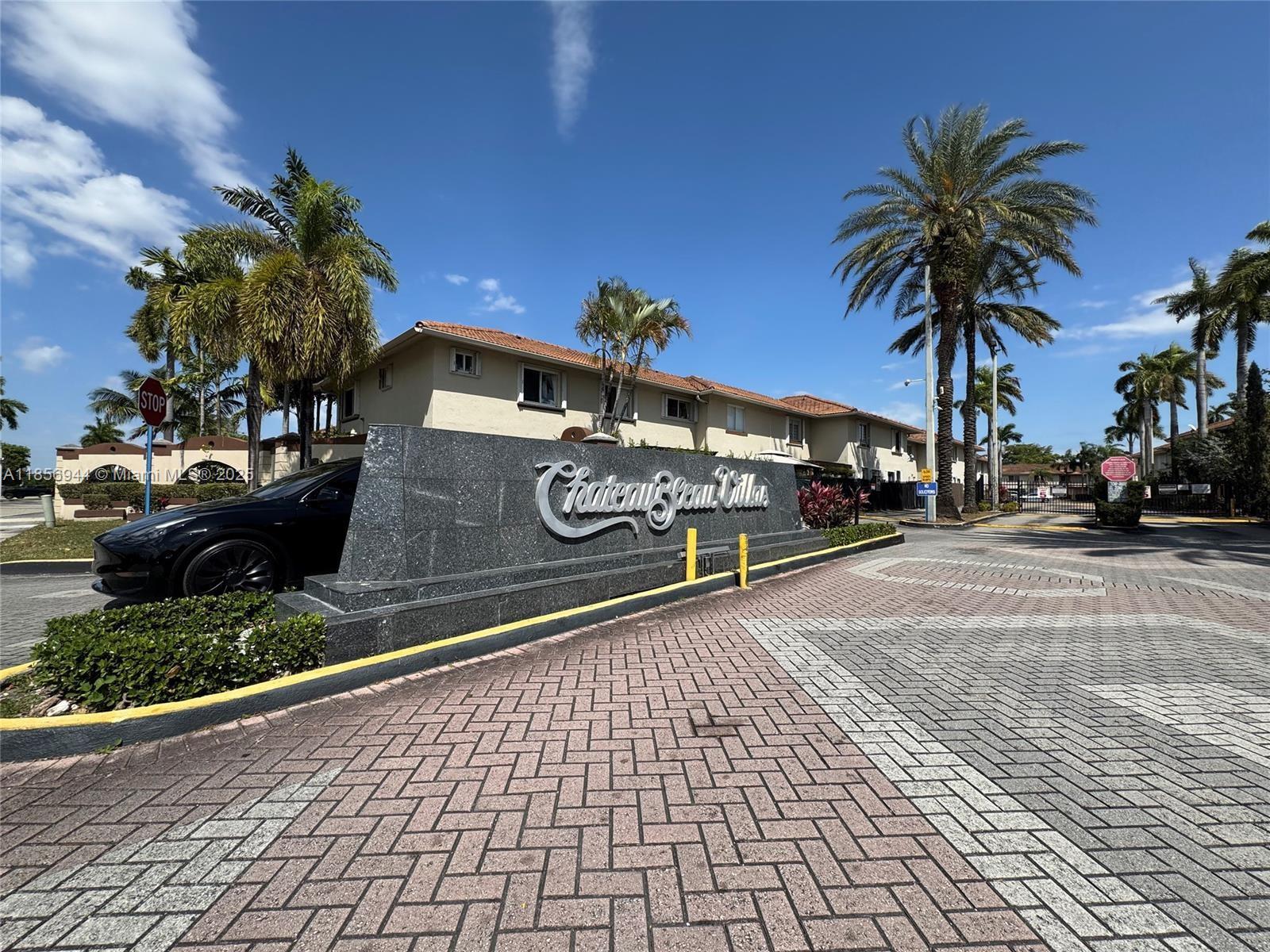 Chateaubleu Villas Is a Must See! features spacious 2 bedrooms, 2 1/2 bathrooms condo-townhouse with a total of 1160 SQFT. Open Kitchen with fairly new appliances, tile flooring in kitchen and living/dining, wood laminate flooring in bedrooms, washer and dryer closet, 2 assigned parking and plenty of parking for visitors. Unit has an excellent floor plan, lots of light and plenty of closet spaces. Ready to move in. Conveniently located across the street from Costco, Mall of Americas, Restaurants and Palmetto Expressway, A+ Schools.