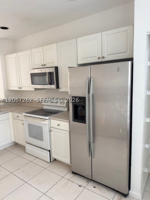 Photo of 677 NW 42nd Ave #677, Plantation, FL 33317 (MLS # A12067262)