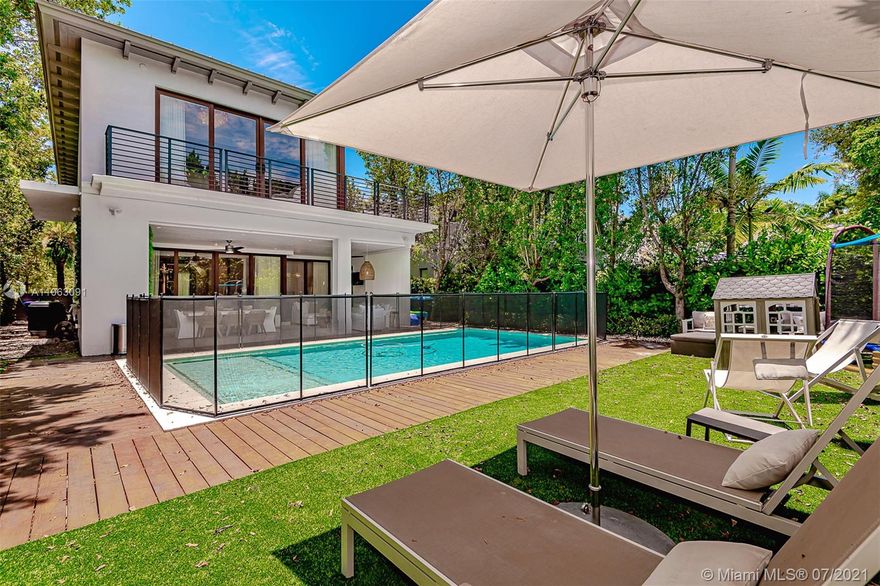 Gorgeous residence in COCONUT GROVE offering the ultimate level of luxury and perfection. This 2 stories contemporary masterpiece has been meticulously designed with exquisite architecture providing both comfort and elegance with spectacular top-of-the-line finishes throughout. 
gorgeous open-style European kitchen. Stainless Steel Thermadore appliances and marble countertops. Each bathroom was designed to have its own spectacular spa-like feel. Offers an incredible  30 X15 pool, massive sun deck & terrace, 5 bed, 4 full baths, and 2 HB, high ceilings 10 ft, outdoor covered built-in barbecue area perfect for entertaining. 
Very close to fun shopping, great restaurants, and nightlife entertainment, minutes from Coral Gables, Brickell, Downtown Miami, and South Beach.