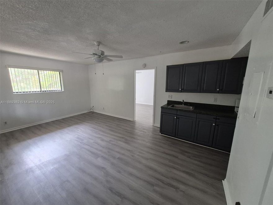 Beautiful and Spacious 1-Bedroom, 1-Bath unit featuring laminated floors throughout. This well -maintained apartment offers central A/C, IN UNIT LAUNDRY, and includes water, sewer and trash in the monthly rent. Conveniently located near to major high ways including the Turnpike and I-95, as well as shopping center and public transportation. Easy to show!!