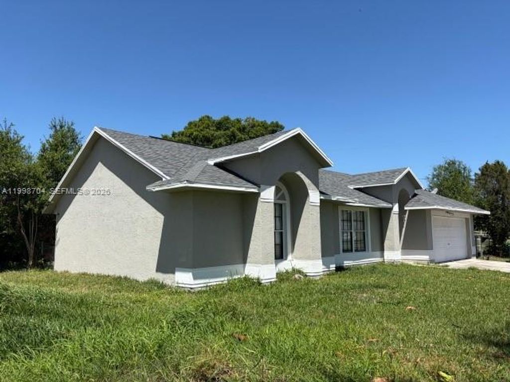 Photo of 2992 SW Lucerne St, Port St Lucie, FL 34953 (MLS # A11998704)